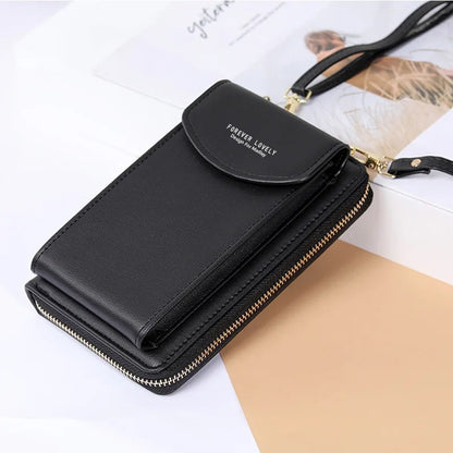 Crossbody Wallet in black color on a table